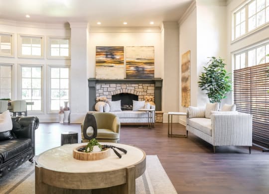 social lounge with fireside conversation areas at Stoneleigh on Spring Creek apartments