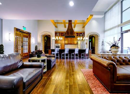 resident entertaining kitchen and social lounging area at Berkshire Village District apartments