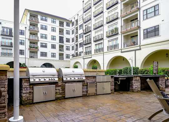 outdoor grilling area at Berkshire Village District apartments