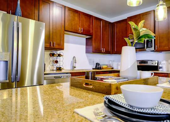 spacious kitchen with custom cabinetry at Berkshire Village District luxury Raleigh apartments