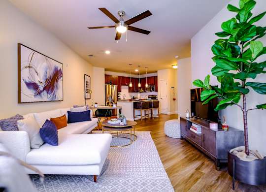 Berkshire Village District apartments living room with hardwood-inspired flooring