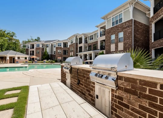 Village at Marquee Station apartments outdoor grilling area