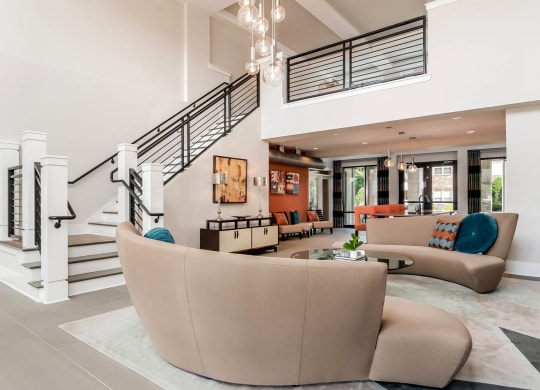 Village at Marquee Station apartments social lounging area with comfortable seating