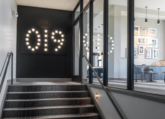 a staircase in the lobby at Tinsley on the Park apartments