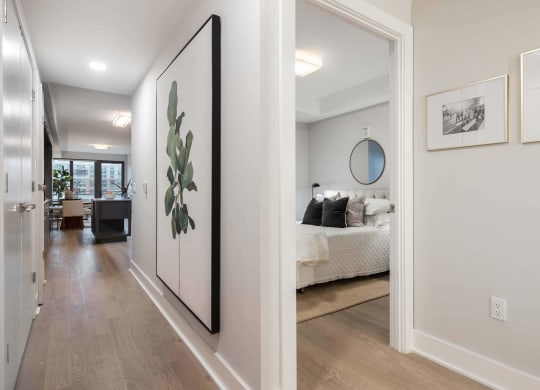 a bedroom and open hallway at Tribeca NOMA apartments