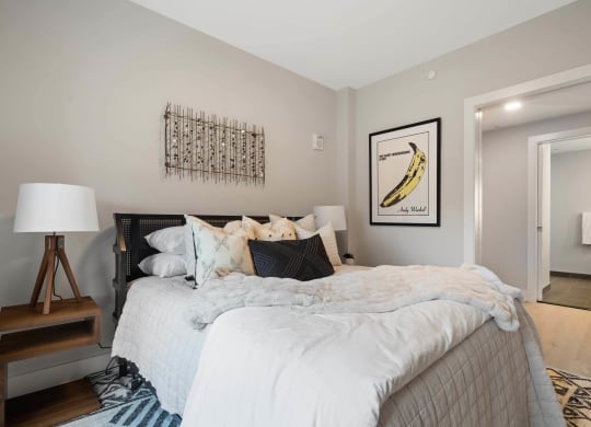 a bedroom with a closet at Tribeca NOMA apartments