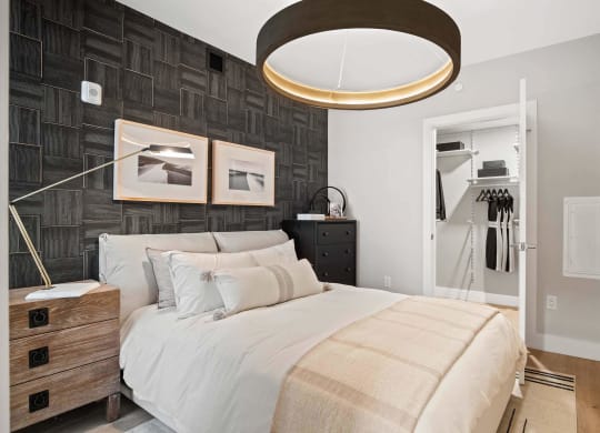 a bedroom and closet at Tribeca NOMA apartments