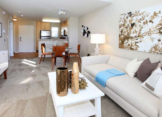 Living room with sofa and coffee table at The Enclave CA, San Jose, CA, 95134