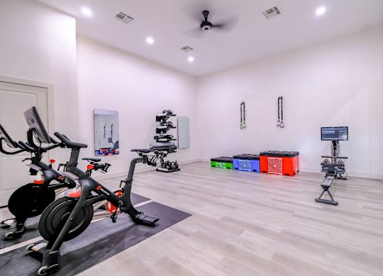fitness center with flex space at The Falls at Copper Lake apartments