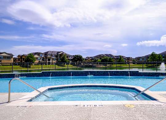 swimming pool at The Falls at Copper Lake apartments