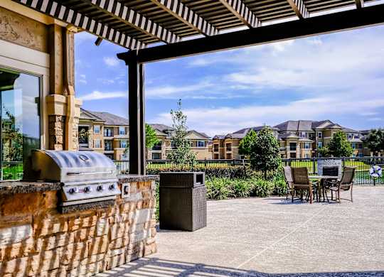 grilling area at The Falls at Copper Lake apartments