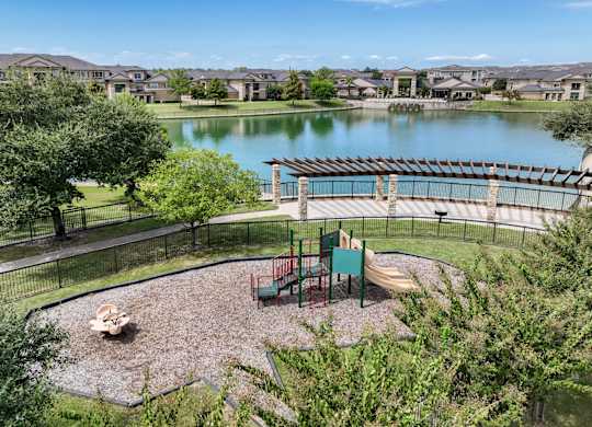 lakeside playground at The Falls at Copper Lake apartments