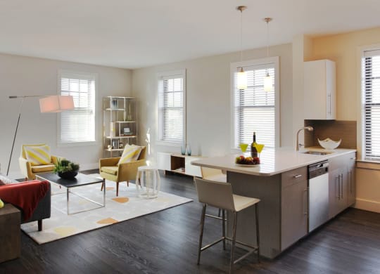 Interior Kitchen with Prep Island and Open-Concept Living and Dining Area at Gatehouse 75, Charlestown, 02129