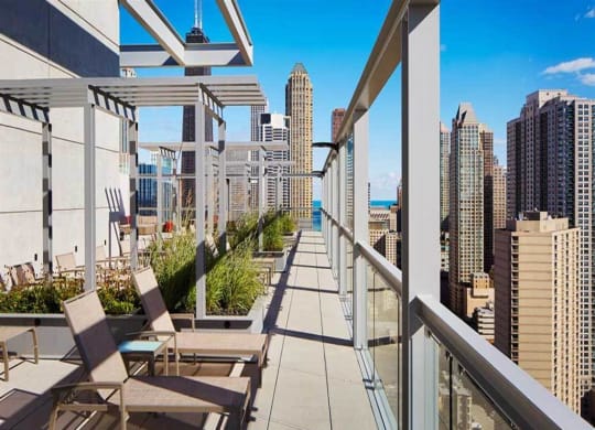 Roof Top Walkway at 805 N. Lasalle Drive Apartments, Chicago, IL. 60610 Rooftop Sundeck with Lake Michigan Views and Chicago City Views