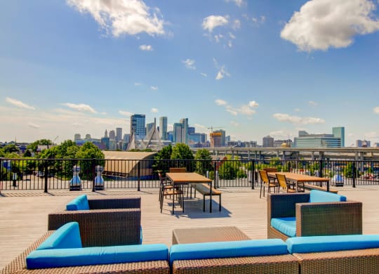 Charlestown MA Apartments with Rooftop Outdoor Living Room with  Fireside Lounge featuring fantastic views of Boston
