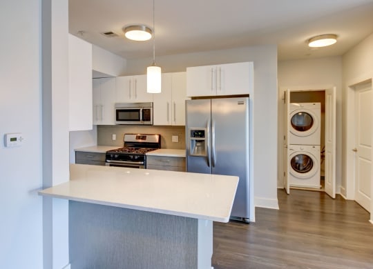 One and Two Bedroom Apartments in Charlestown MA with Bay Windows with Open-Concept Gourmet Kitchen with Breakfast Bar, Stainless Appliances and Washer Dryer
