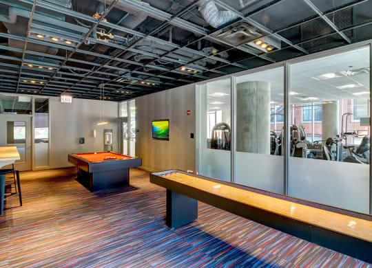 Eight O Five apartments Game room with billiards and shuffleboard at 805 N. Lasalle Drive Apartments