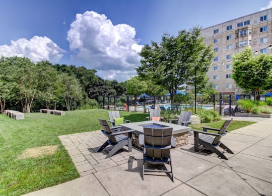 HighPoint Apartments Outdoor Living Room with Green Space, FirePit, Pool, Gaming, Outdoor Kitchen with BBQ and Alfresco Dining