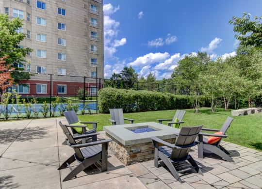 Outdoor Living Green Space with Firepit and Outdoor Movies--HighPoint Apartments Quincy MA