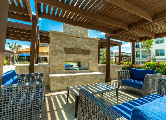Pool side sitting area at Parkat Bayside, Texas, 75088