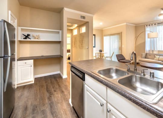 Kitchen with adjacent built in desk