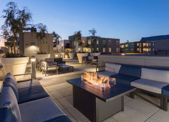 Common area rooftop deck firepit at Lyric, California, 94596