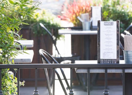 Restaurant table with menu at Lyric, California, 94596