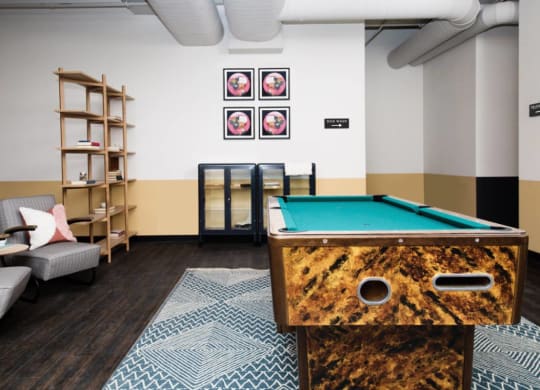 The Edison apartments game room with billiards