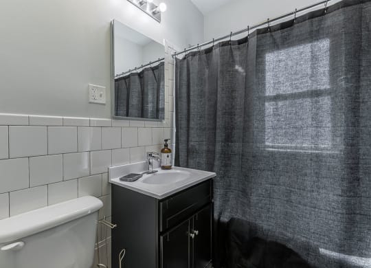 The Edison apartments bathroom with tile surrounds