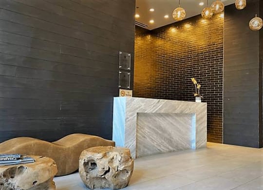 a lobby with a reception desk at Tribeca NOMA apartments