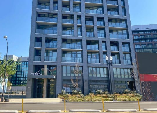 a street view of the exterior of Tribeca NOMA apartments in Washington DC