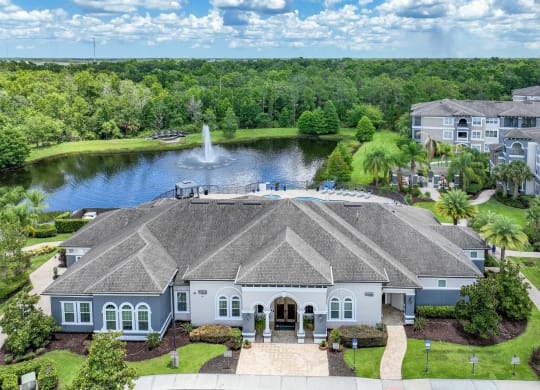 aerial view of the club house with lake and fountain