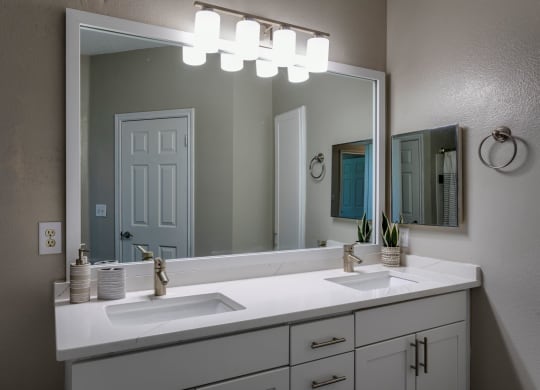 Bathroom with designer lighting and quartz countertops  at Wyndchase Aspen Grove, Franklin, 37067