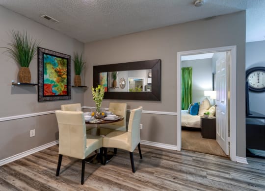 Dining room with wood inspired flooring at Wyndchase Aspen Grove, Franklin