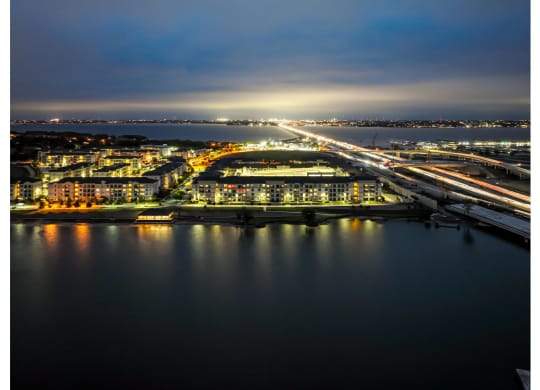 Twilight Aerial View of Reveal at Bayside Apartments  8400 Sunset Blvd Rowlett, TX 75088