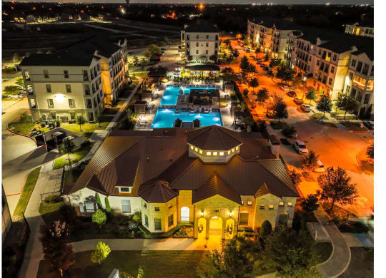 Evening Aerial View of Reveal at Bayside Apartments  8400 Sunset Blvd Rowlett, TX 75088