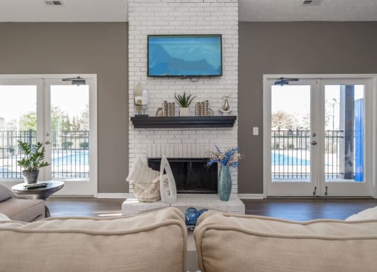 Sterling Park apartments social lounge with fireplace