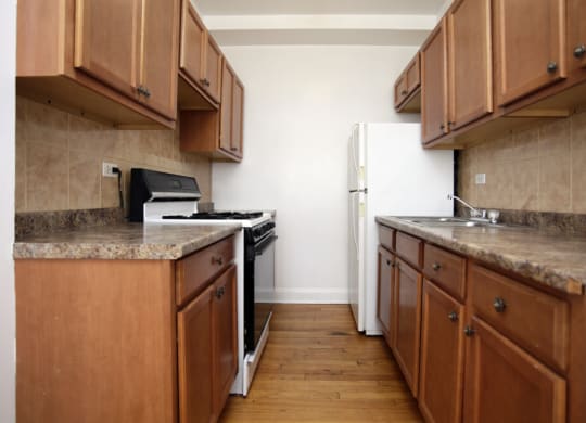 The Edison apartments kitchen with wooden cabinets