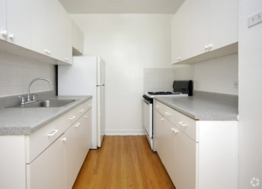 The Edison apartments kitchen with white cabinetry