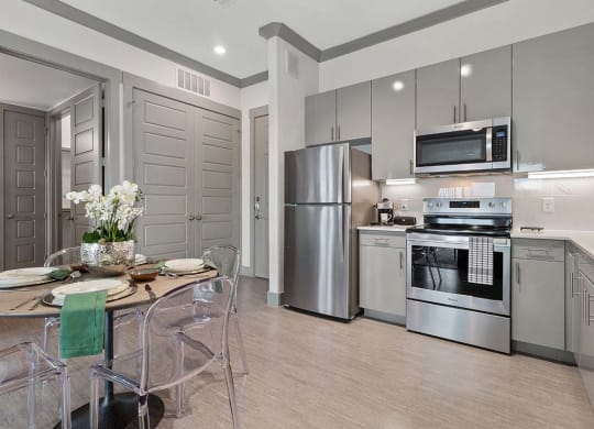 KITCHEN WITH DINING at Reveal Skyline  at La Cantera, San Antonio, TX, 78256