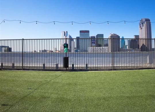 a view of the Dallas city skyline near The Gabriella apartments