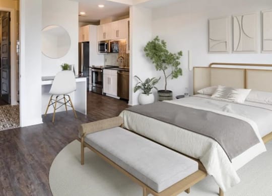 spacious bedroom with a ceiling fan at The Gabriella apartments