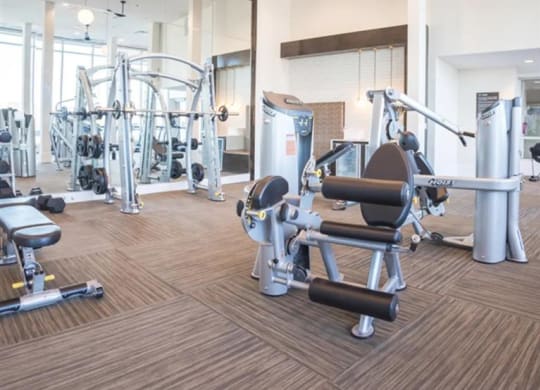 exercise equipment in the fitness center at The Gabriella apartments
