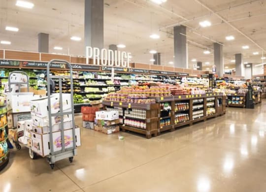 fresh produce isle at a grocery store near The Gabriella apartments