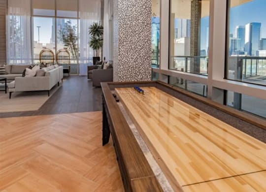 social lounge with shuffle board at The Gabriella apartments