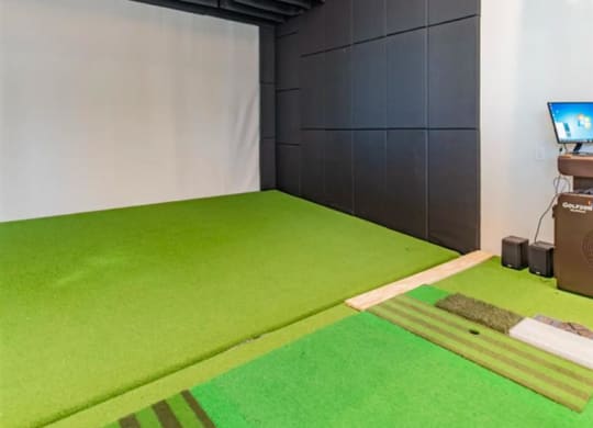 golf simulator amenity at The Gabriella apartments