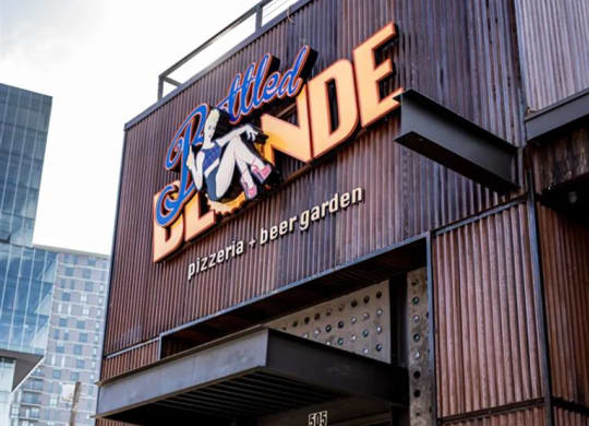 exterior view of a restaurant near The Gabriella apartments