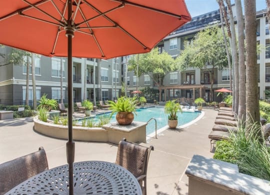 Poolside Dining Tables at The Plaza Museum District, Texas