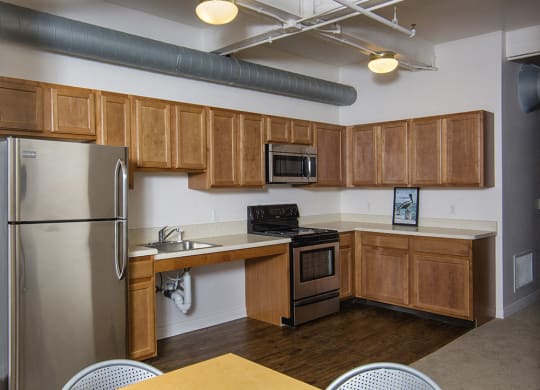 Spacious kitchen with appliances at the Lofts at 5 Lyon, in downtown Grand Rapids, MI