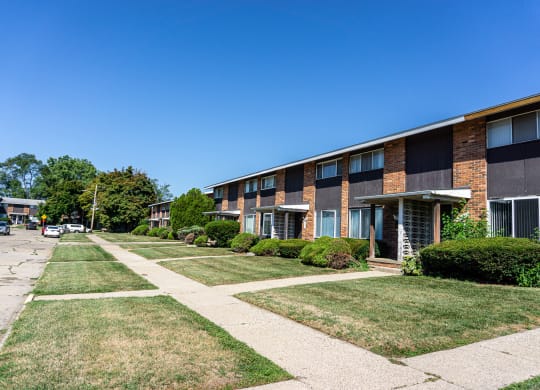 Sidewalks and building exteriors at Carriage House Apartments in Flint, Michigan